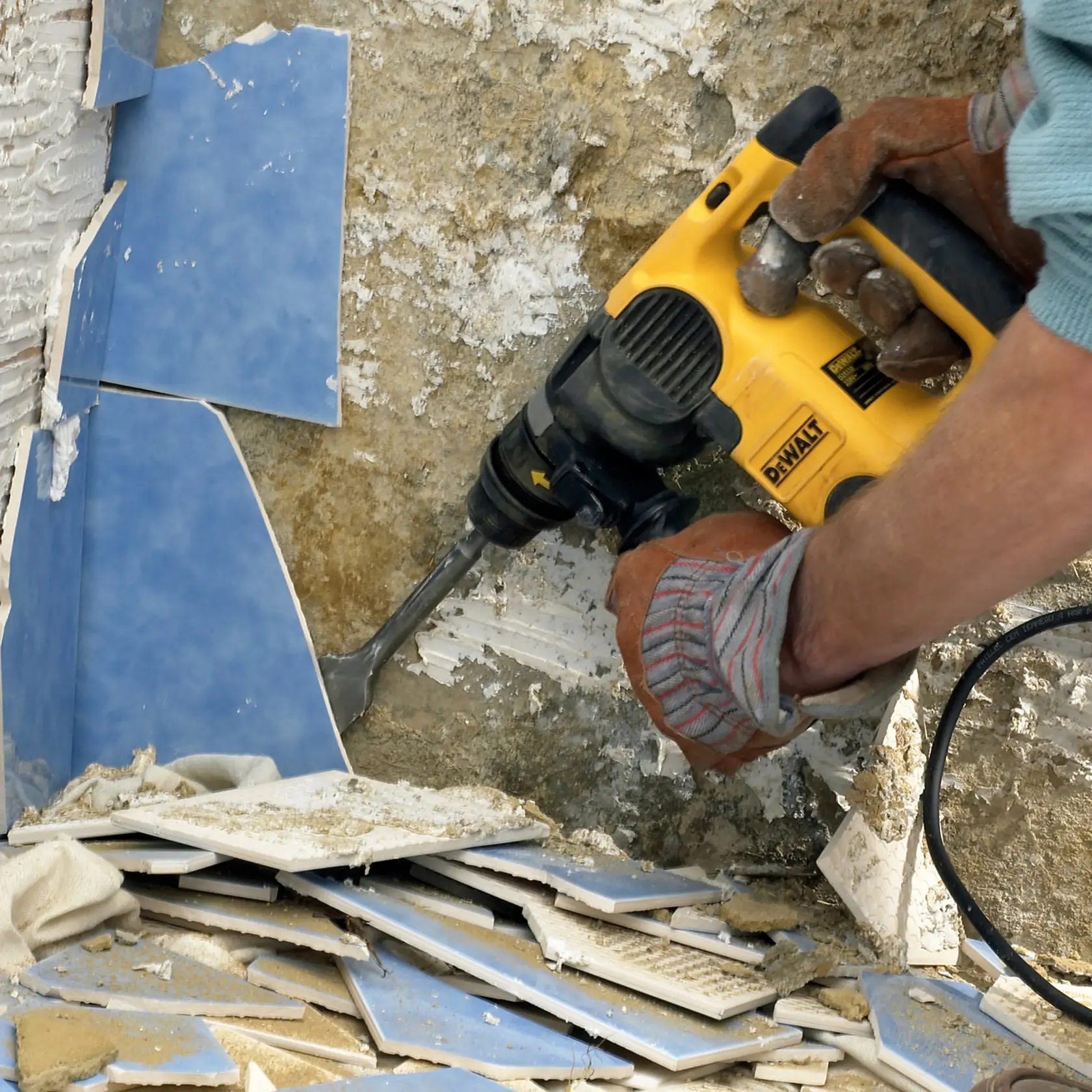 A DEWALT chisel bit with a flat blade and SDS shaft, designed for demolition and masonry tasks.