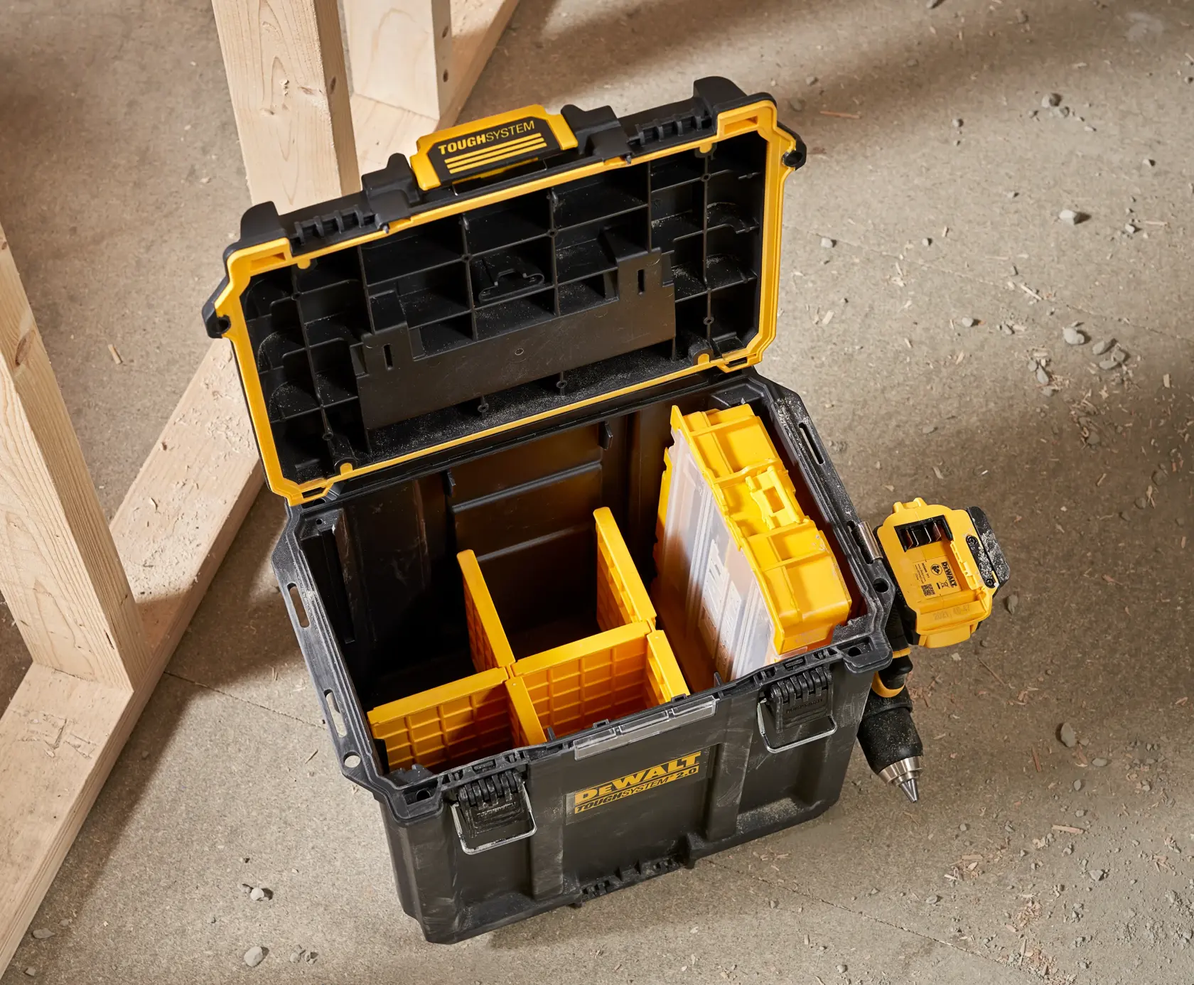 DEWALT ToughSystem 2.0 promotional graphic with the slogan 'Storage Built to Handle It' in large, bold yellow lettering on a dark, textured background.